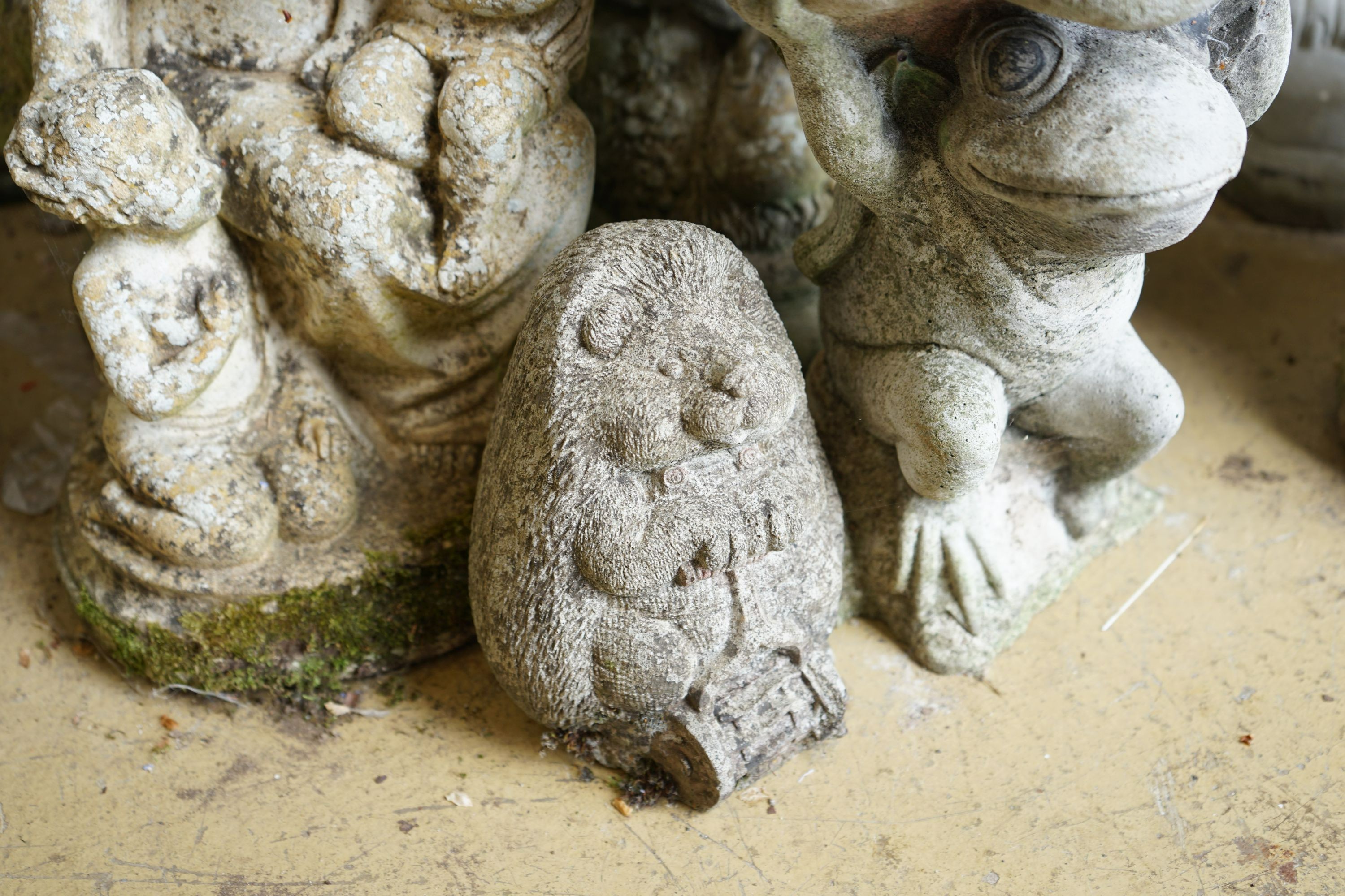 Five reconstituted stone garden ornaments, largest height 55cm